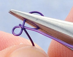Pliers holding wire shape